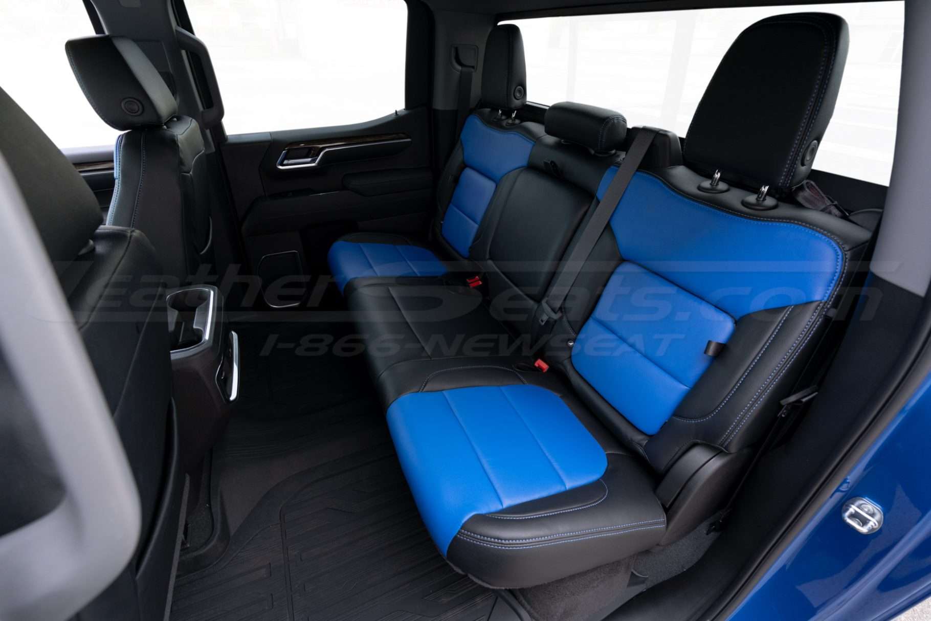 2019-2024 GMC Sierra with installed black and cobalt blue leather seats - Rear seats driver side