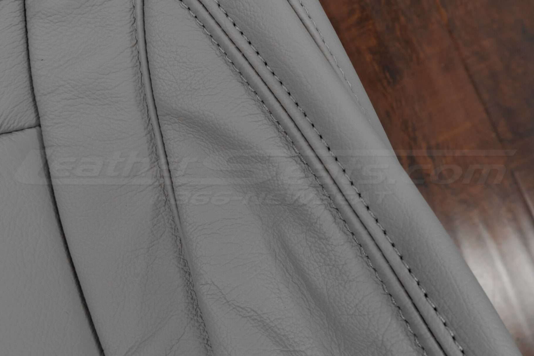 Ash double-stitching on Ash leather