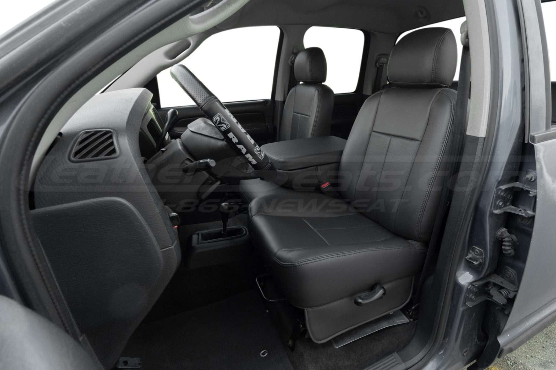 Dodge ram front driver seat with Dark Graphite leather - 20% jumpseat folded down