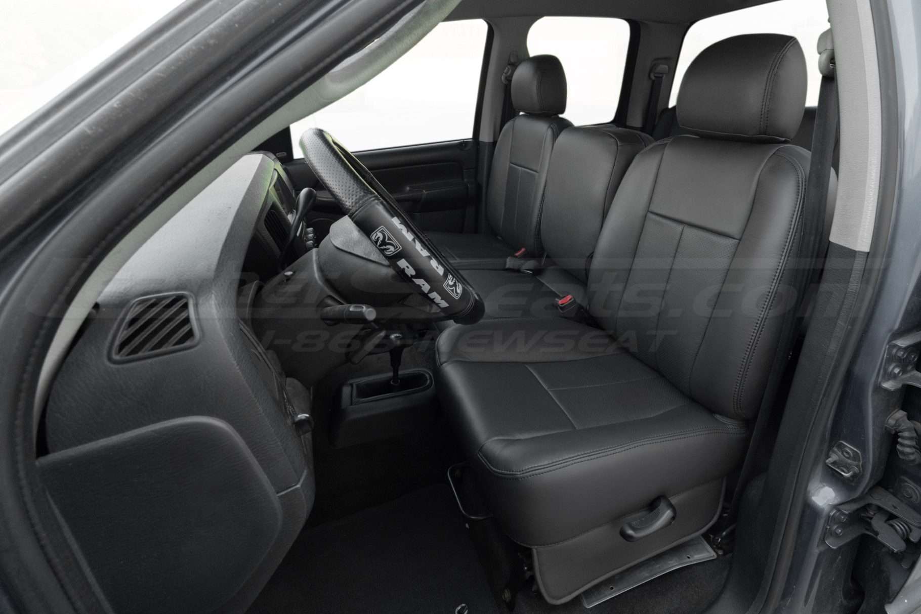 2002-2005 Dodge Ram 1500/2500/3500 with installed leather seats in Dark Graphite - Front driver seat with jump seat up