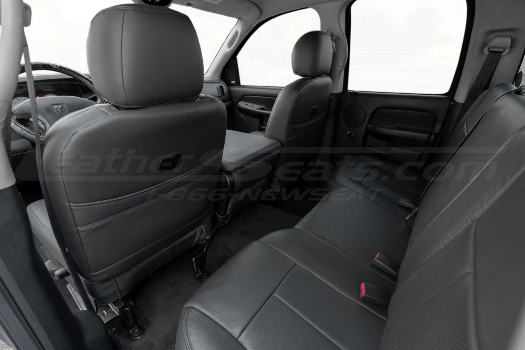 Back view of front leather seats show air intake for ventilation system