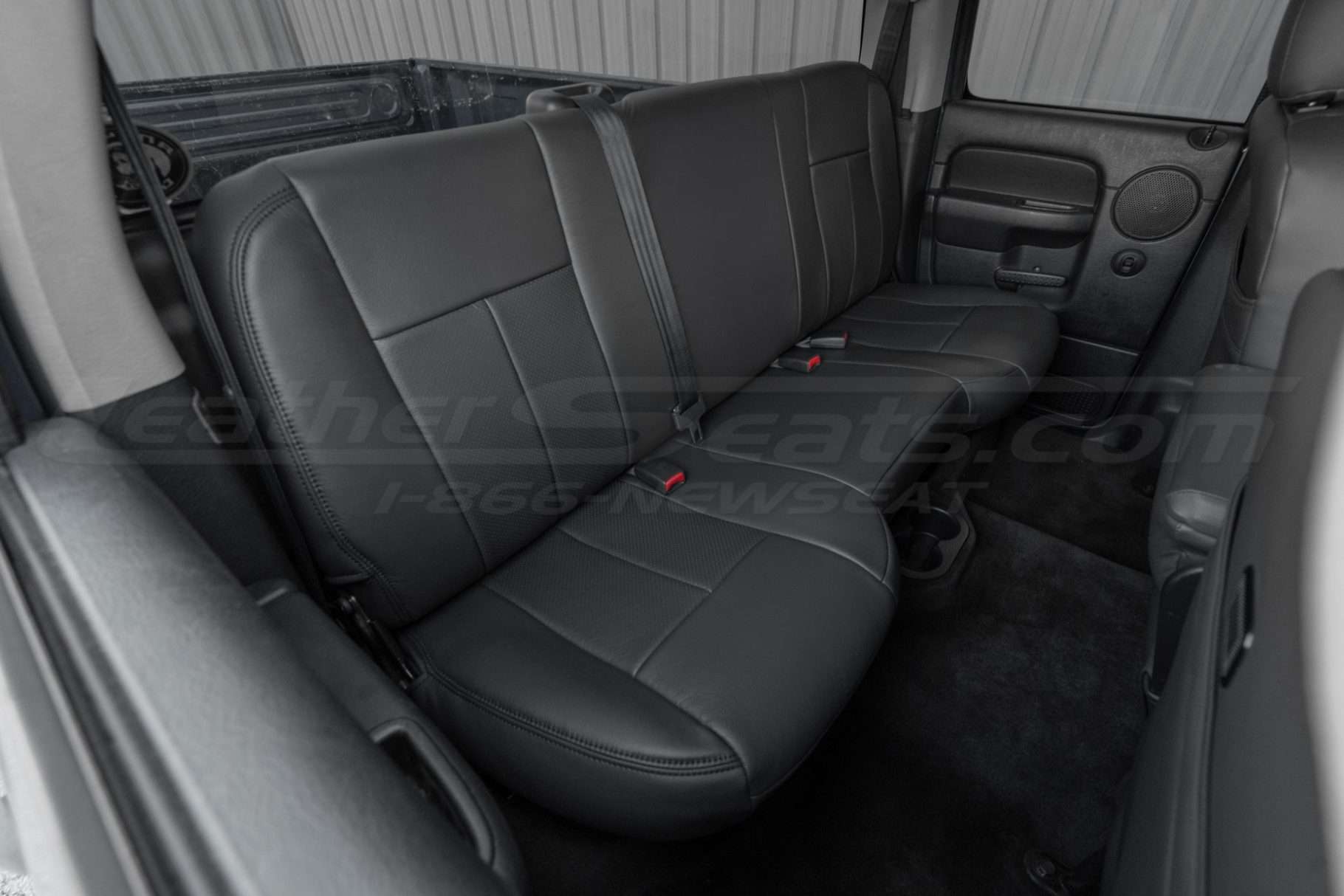 2002-2005 Dodge Ram Quad Cab with aftermarket Dark Graphite leather seats- installed - rear seats from passenger side