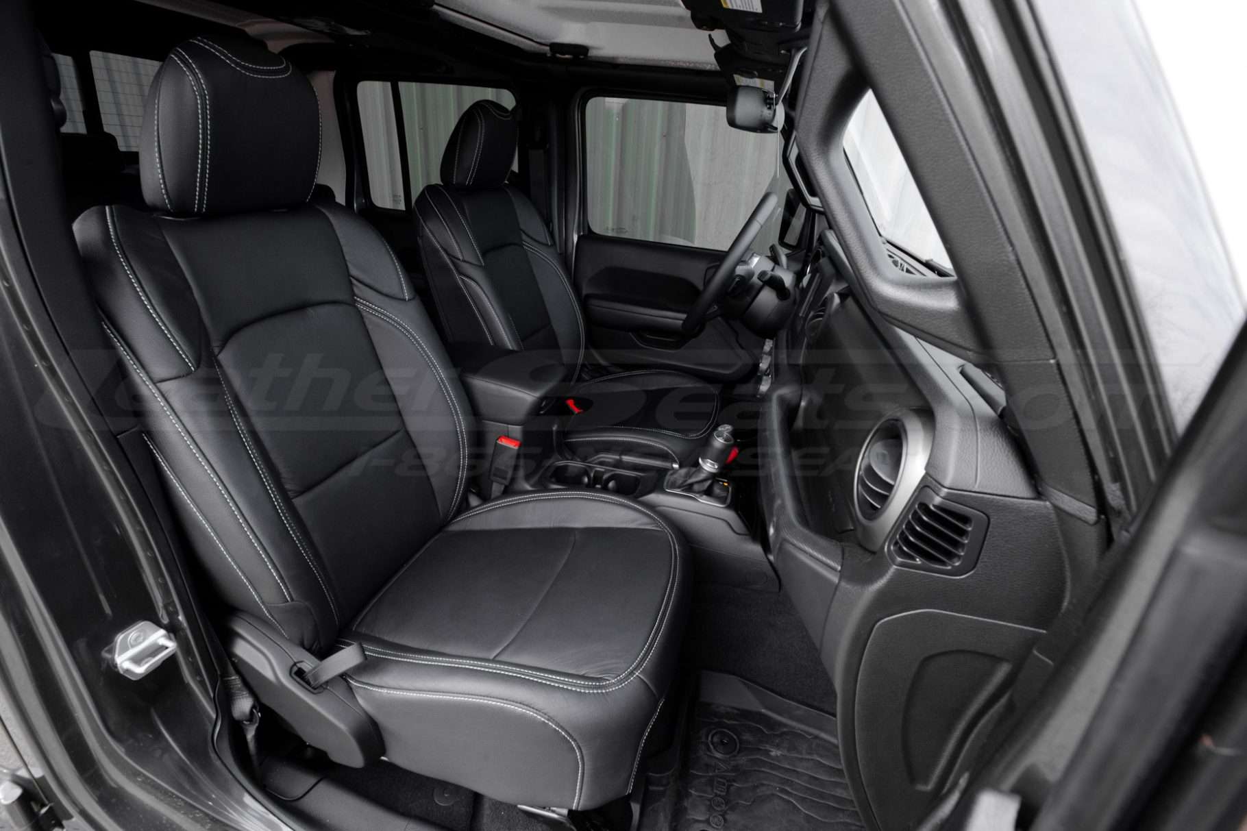 Installed black leather seats for black Jeep Gladiator interior
