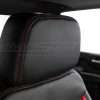 Black leather headrest with contrasting Bright Red stitching