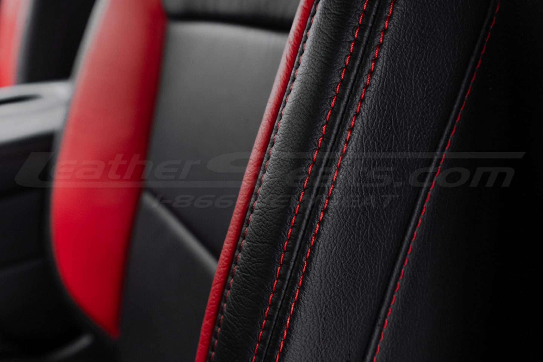 Contrasting Bright Red double-stitching on backrest side bolster