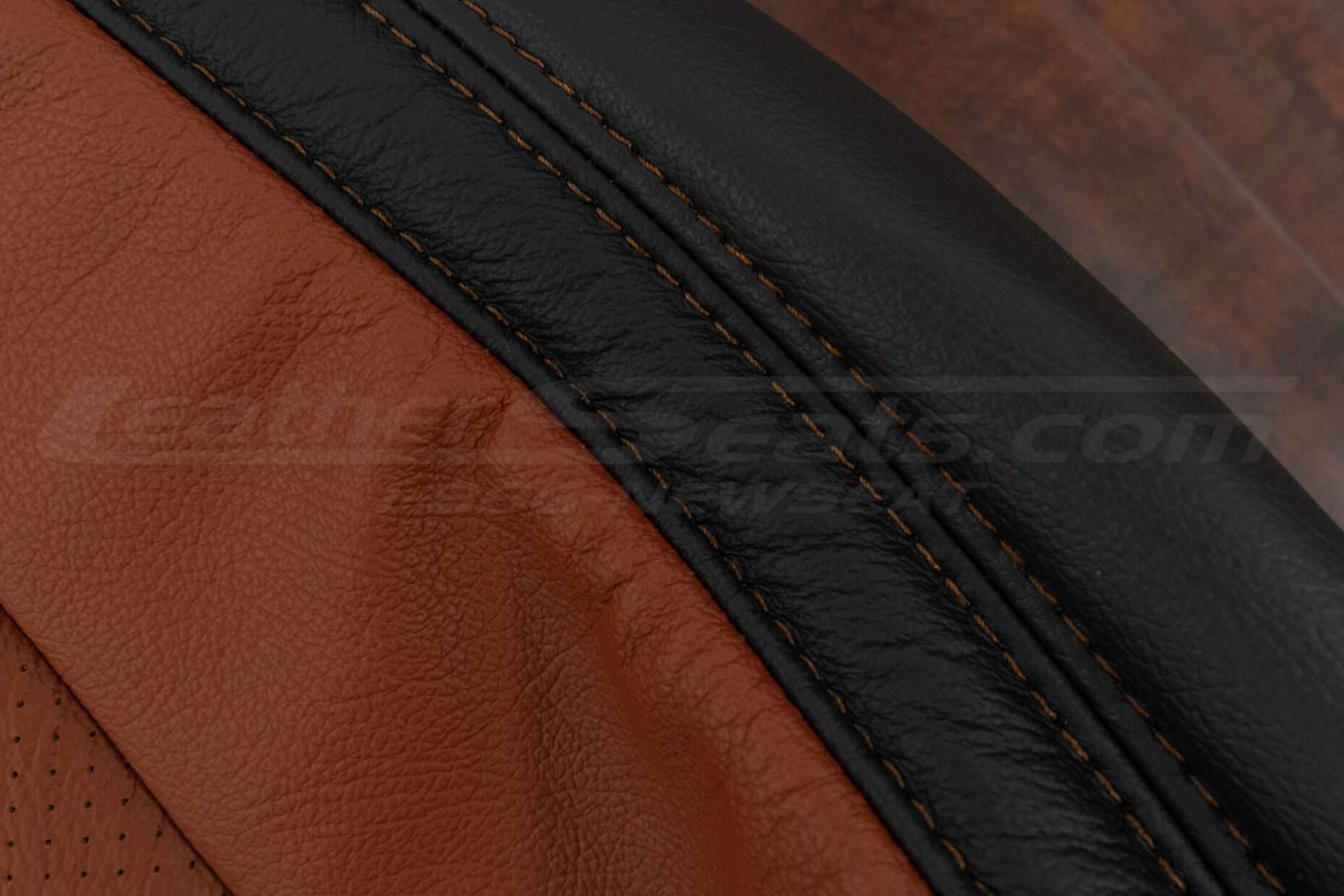 Contrasting Mitt Brown thread on black leather