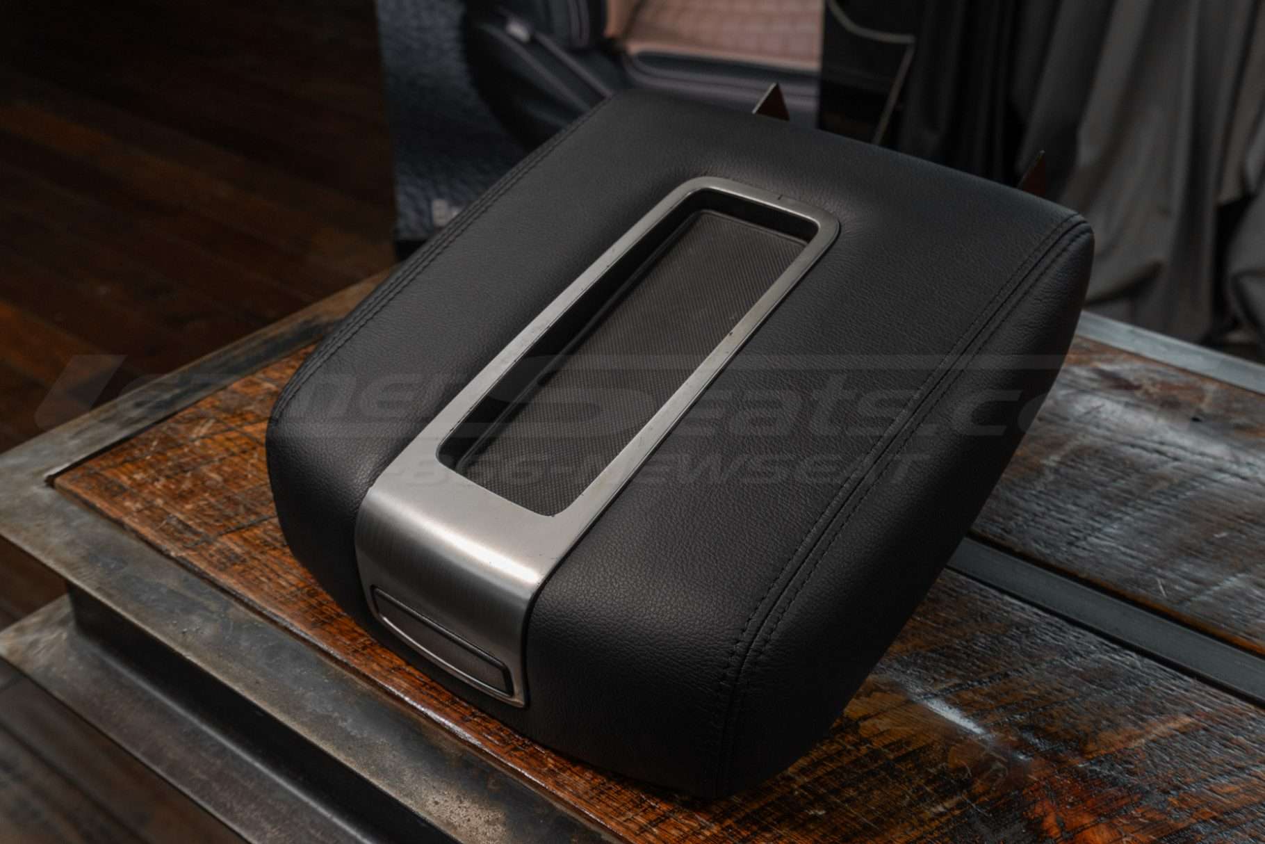 Low side view of Hummer H2 installed leather console lid cover