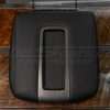 Top-down flat lay of Hummer H2 console lid cover in black leather