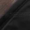 Black double-stitching on black leather closeup