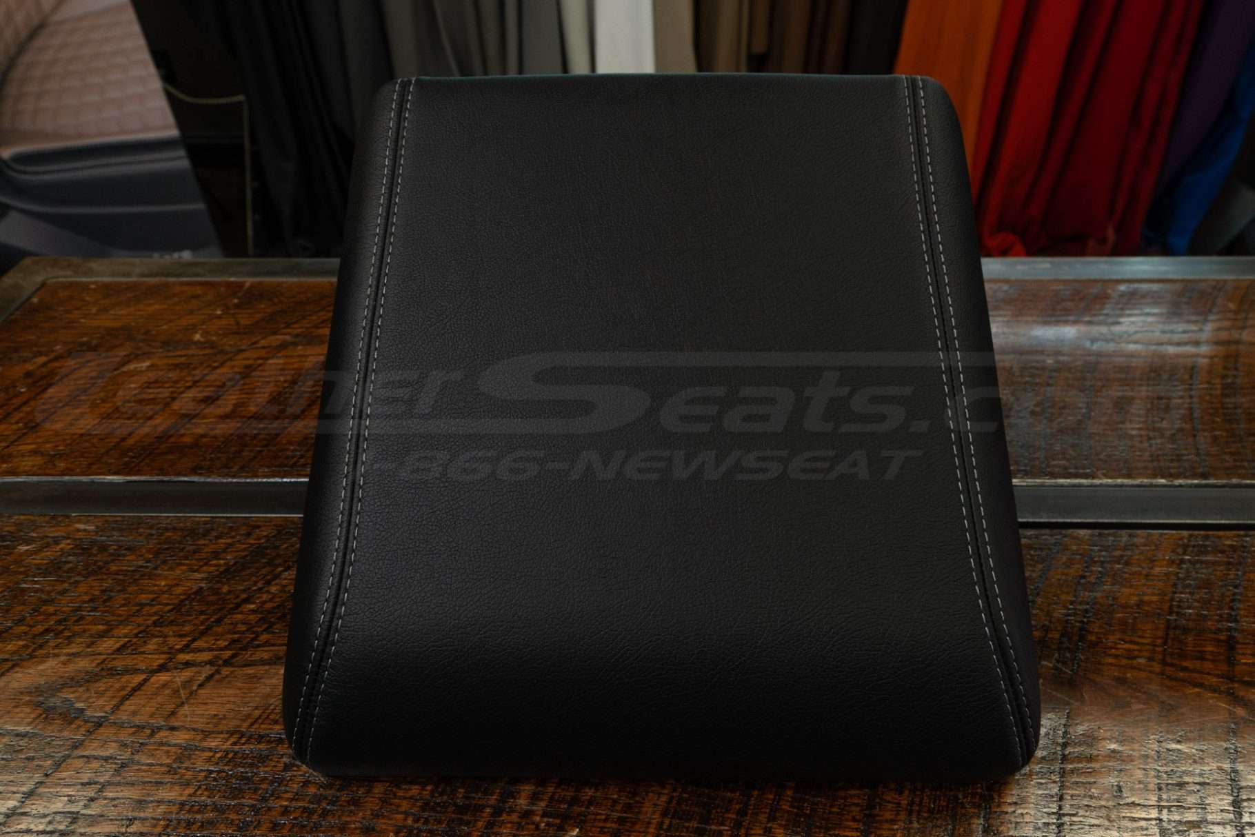 Flat on view of black leather console for 2021-2024 Ford F-150