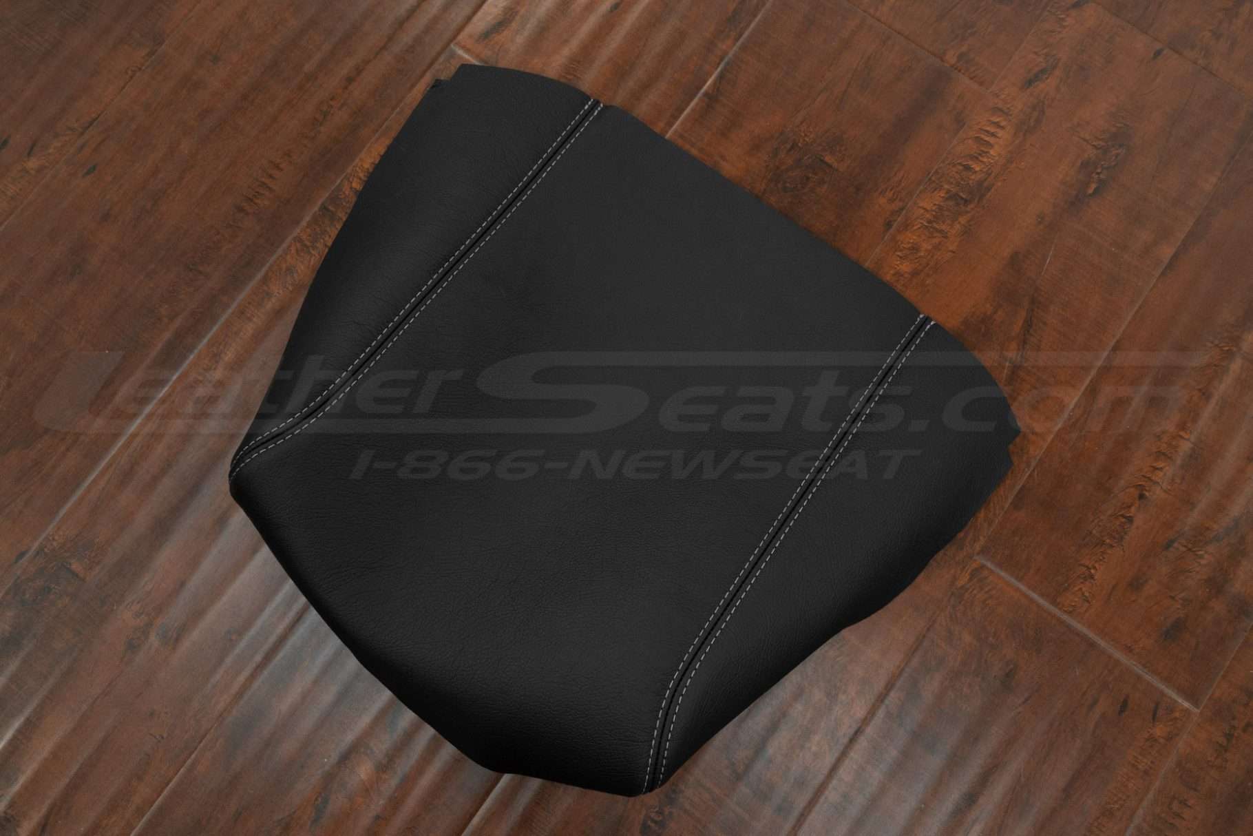 Top-down side view of leather console lid cover upholstery for ford trucks
