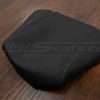 Alternate flat lay of black cnnsole lid cover for 2021-2024 Ford F-150 trucks