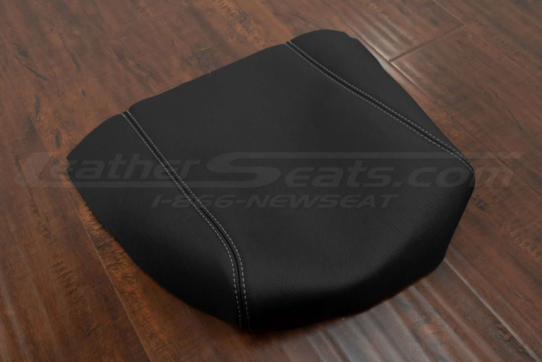 Side flat lay of leather console lid upholstey in black for ford f-150