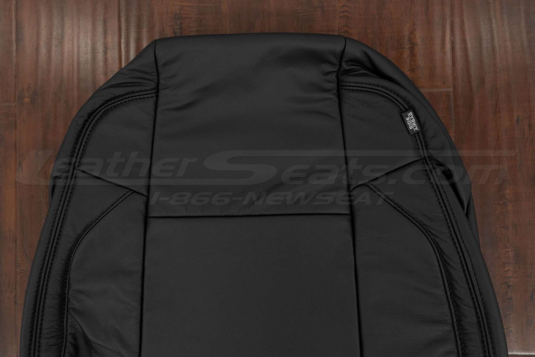 Upper section of leather backrest upholstery