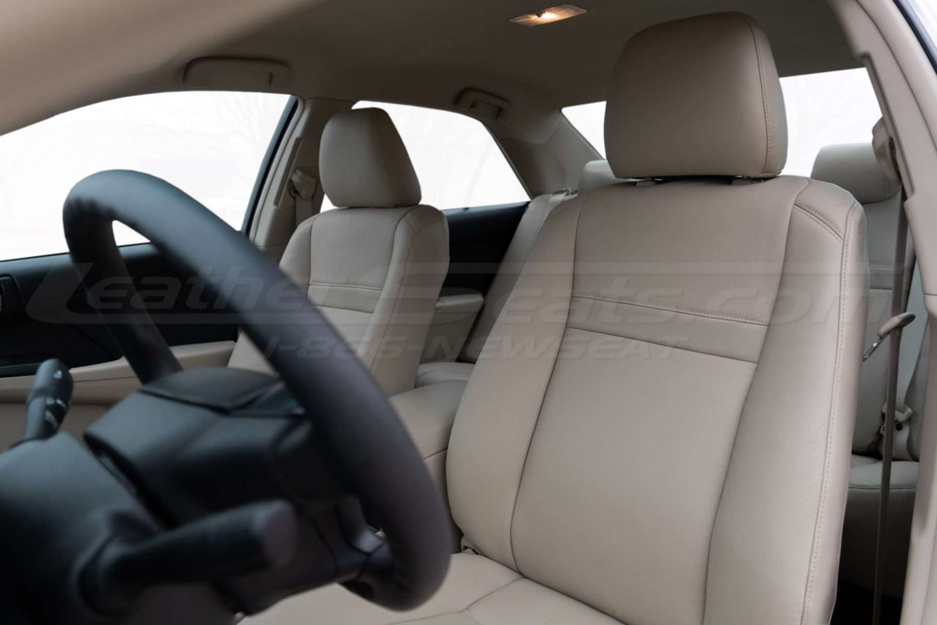 Installed leather toyota camry leather seats in ivory - front abckrest & headrest section
