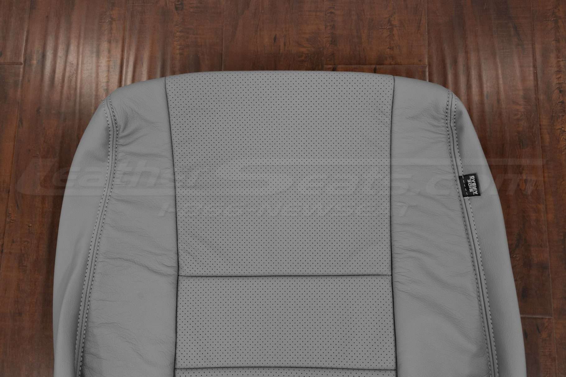 Upper section of leather backrest upholstery