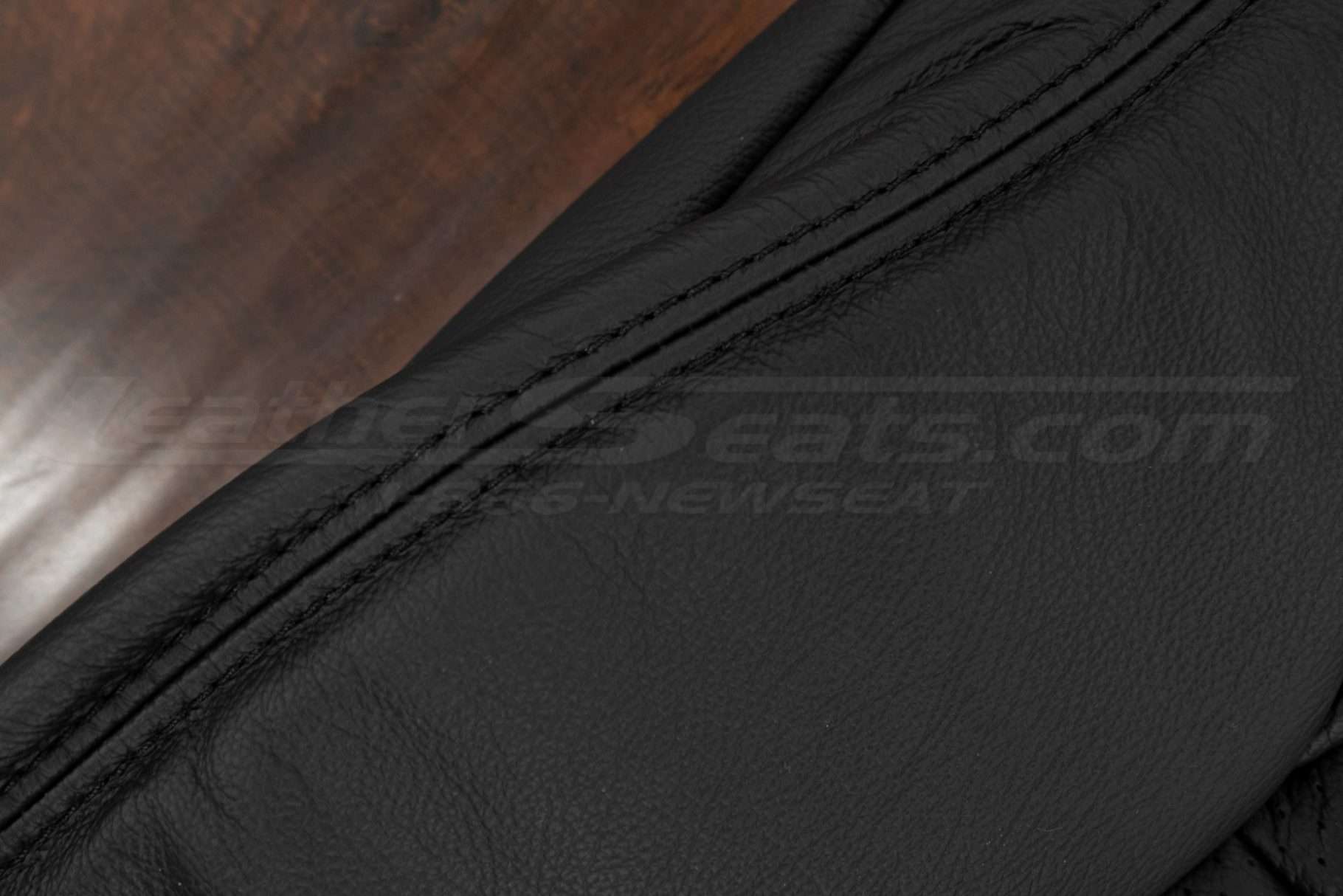 Nissan 350Z black stitching on leather backrest