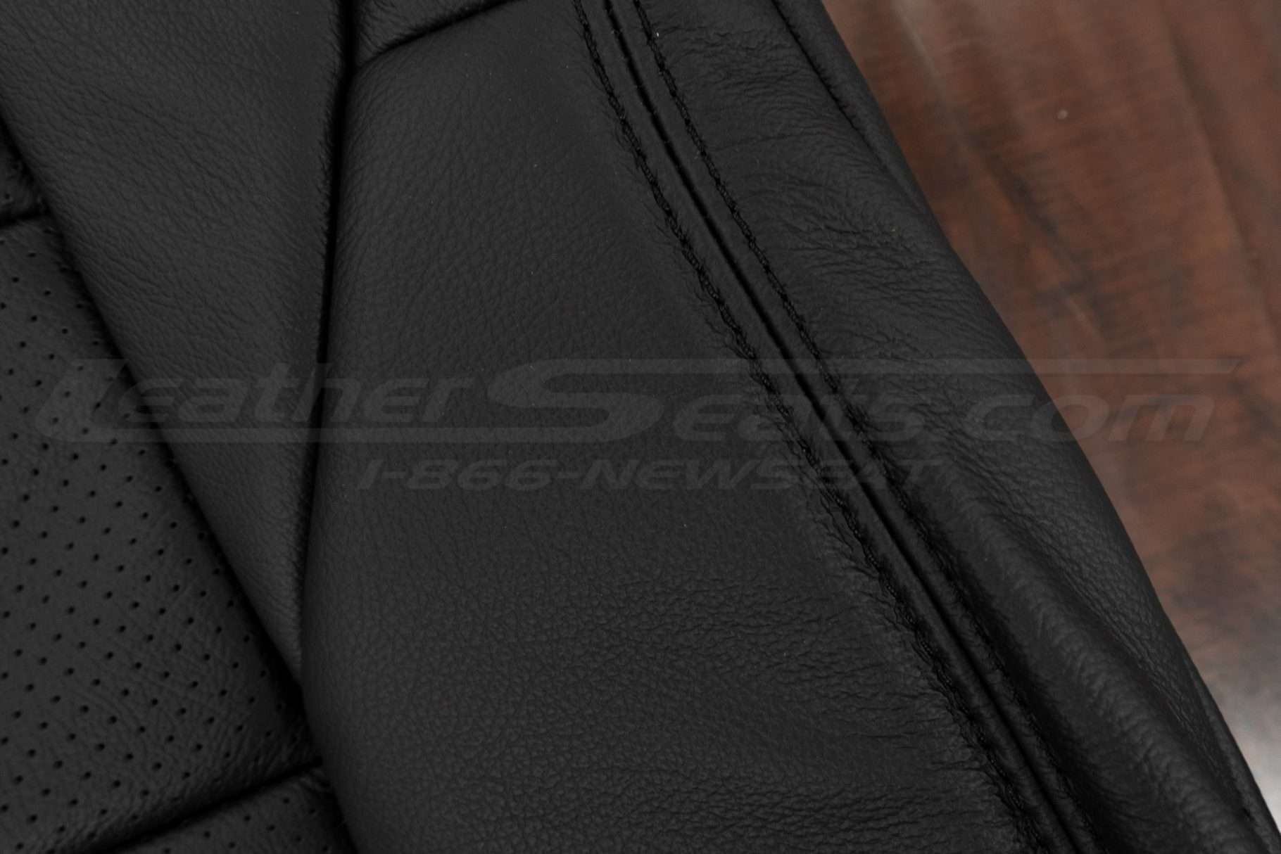 Matching black doubl-stitching on Black leather