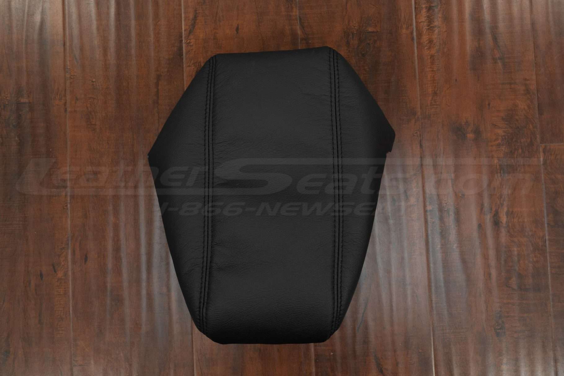 Top-down flat lay view of leather console lid cover for 2011-2015 Dodge Durango