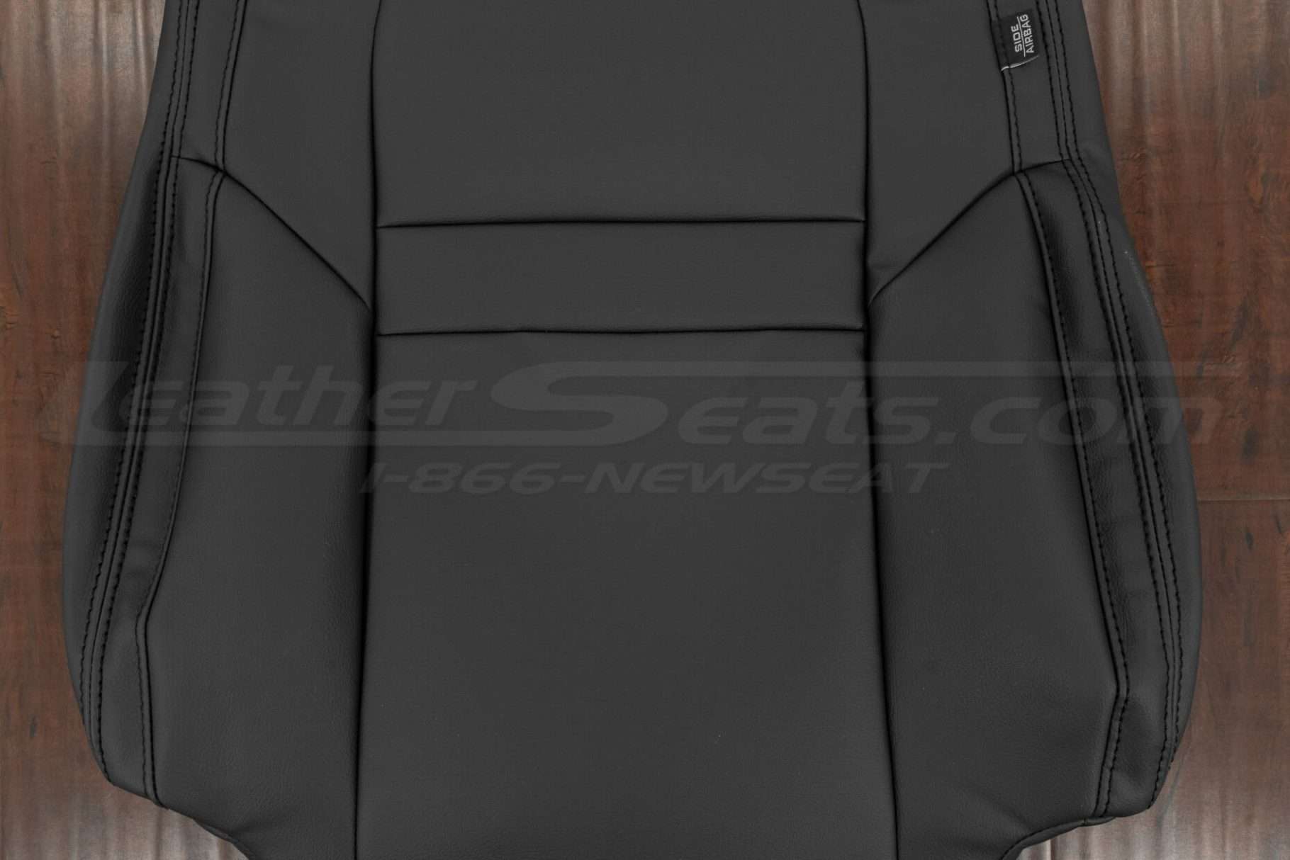 Insert section of Nissan Frontier backrest upholstery