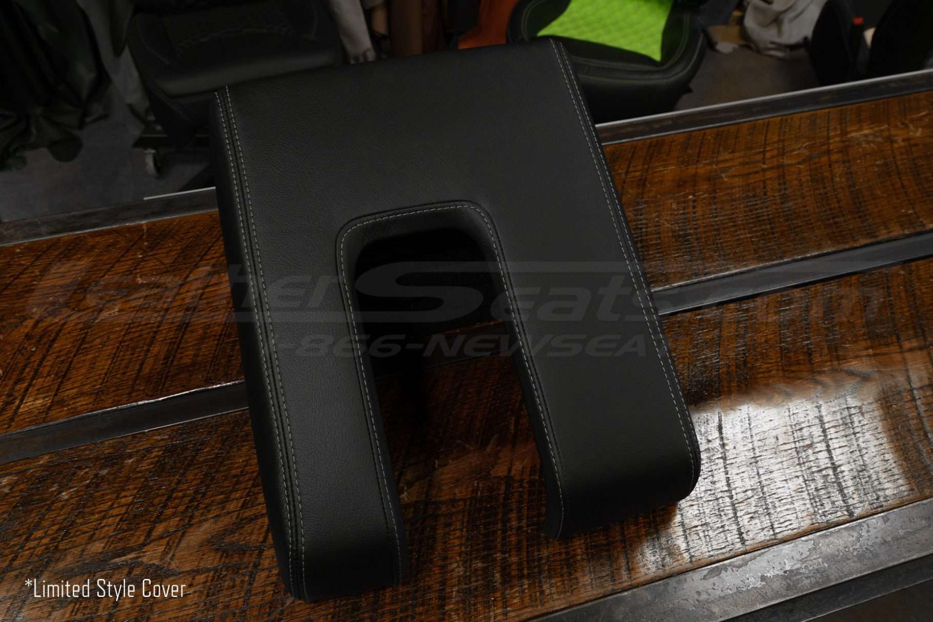 Top-down side view of 100% leather center console lid cover for toyota tundra trucks