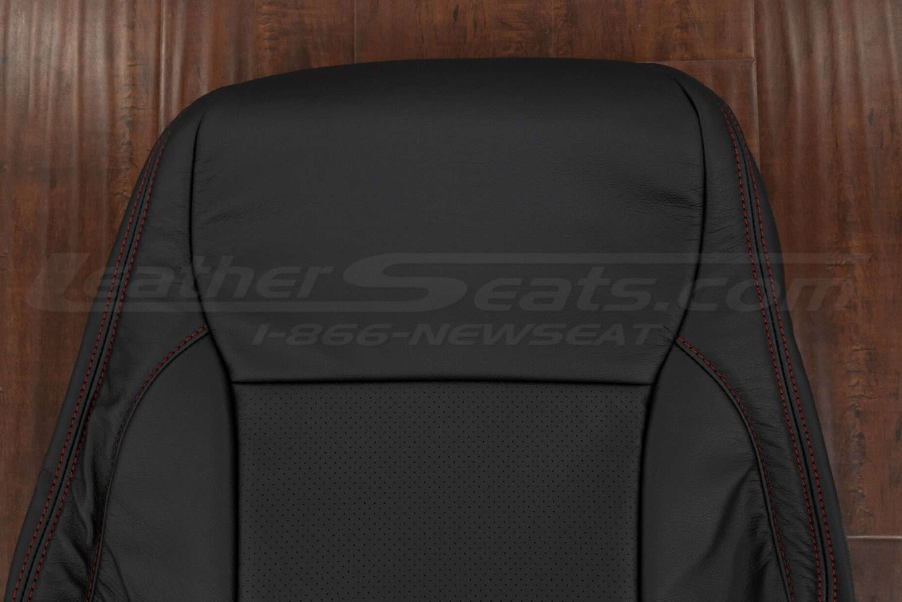 Upper section of black leather backrest
