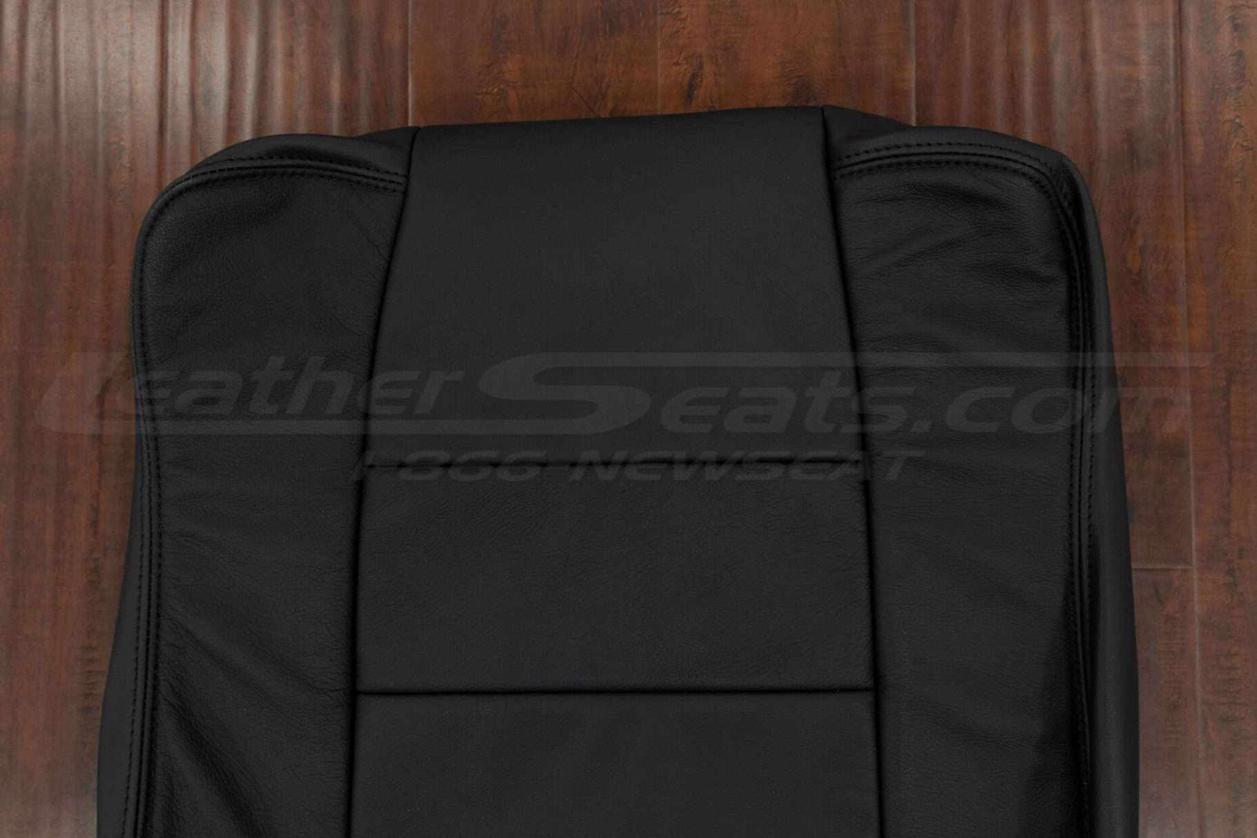 Upper section of front backrest upholstery