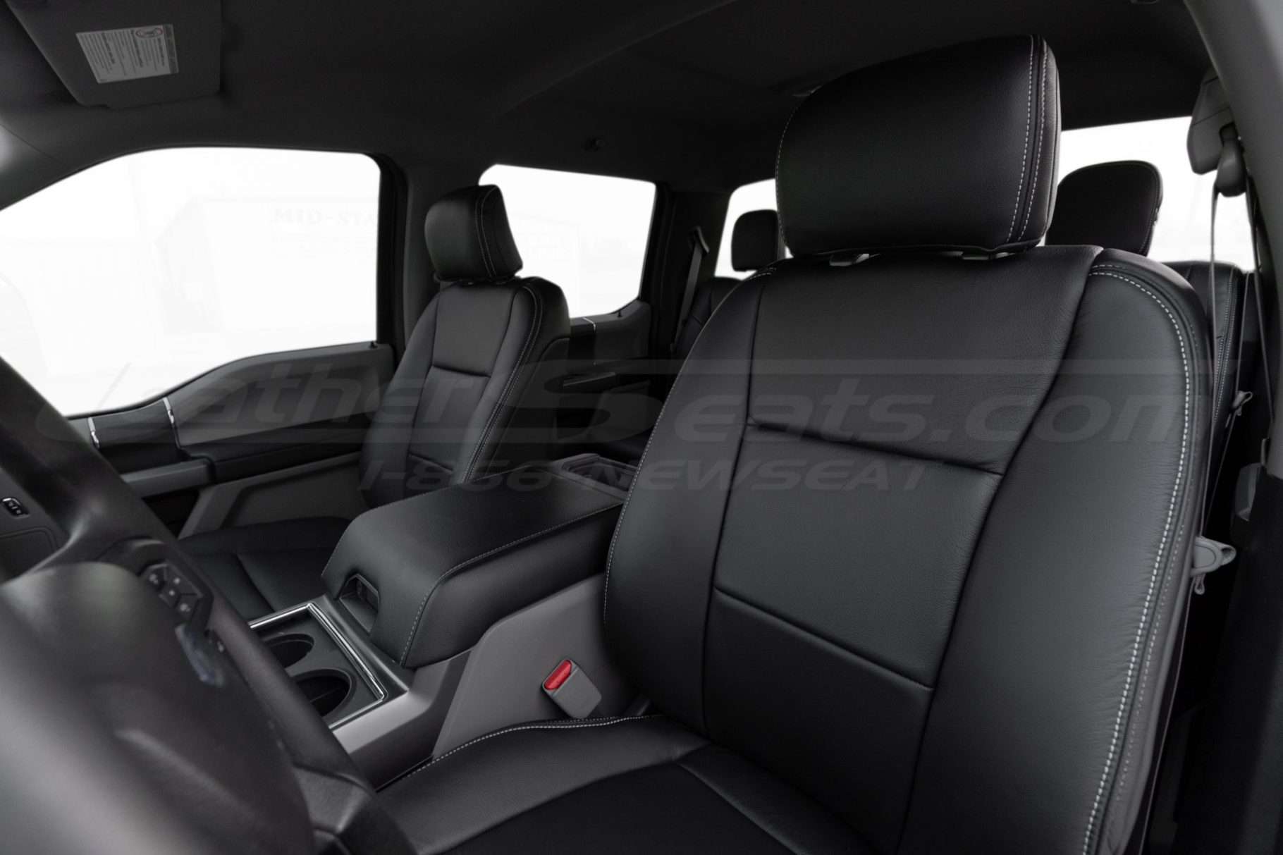 Medium shot of black leather headrest and backrest installed
