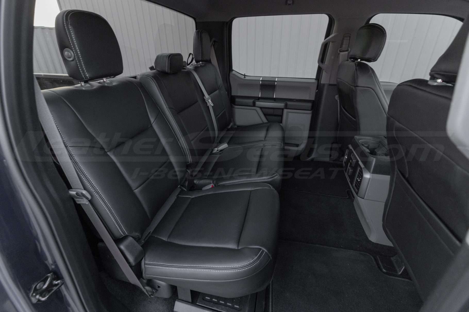 2017 Ford F-250 with custom installed black leather seats - Rear seat passenger side