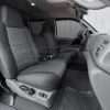 Ford superduty passenger side leather seat with LeatherSeats.com upholstery installed - Jump seat in sitting position