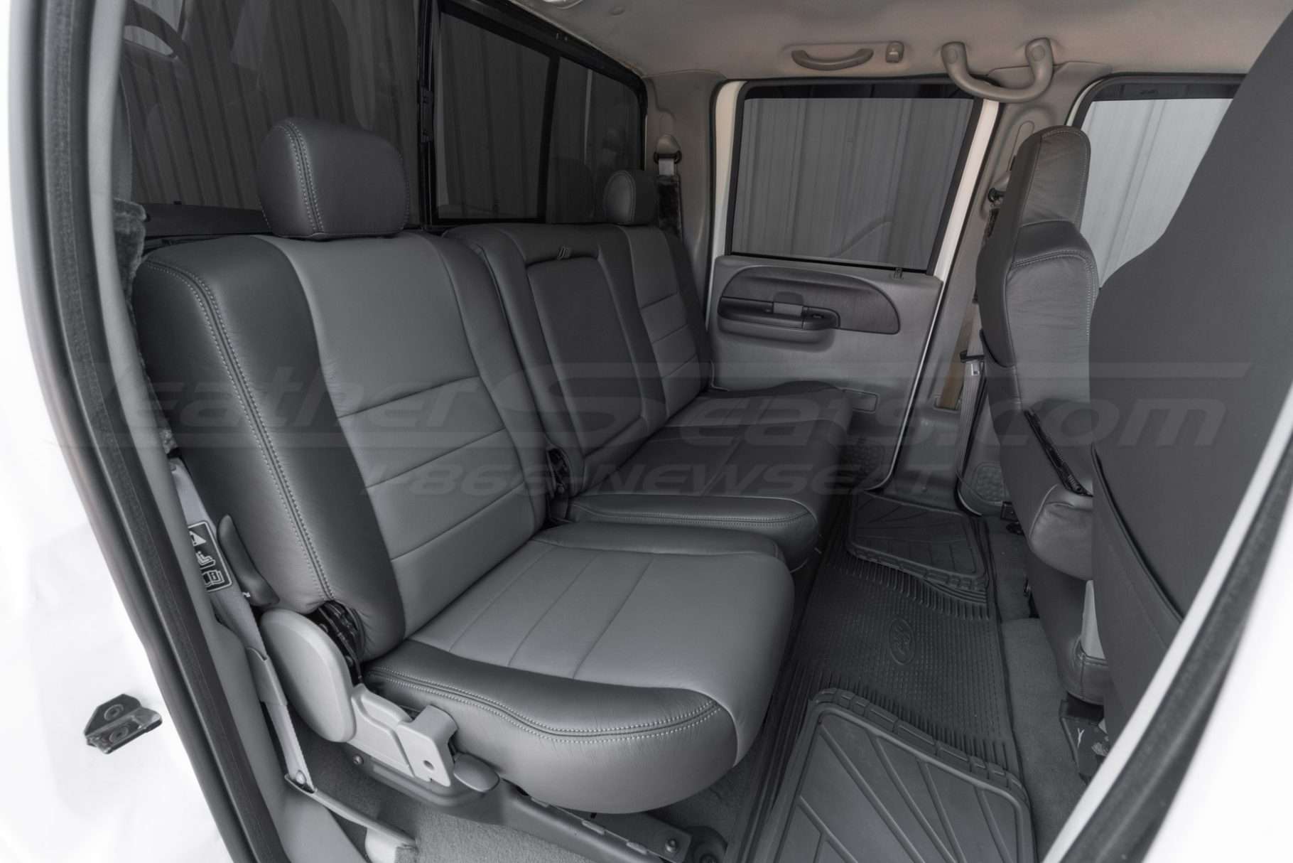 2004-2010 Ford Superduty with installed rear leather seats in Graphite wwith light grey body