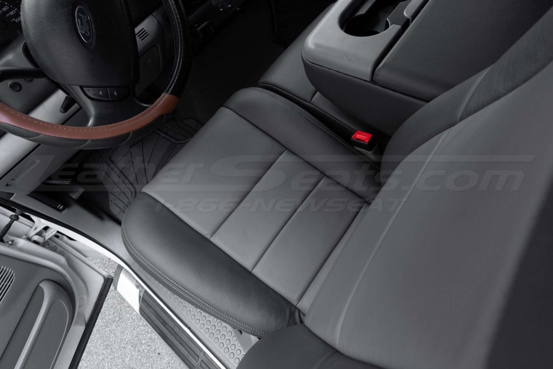 Top down view of installed leather seats on front driver ford superduty seat
