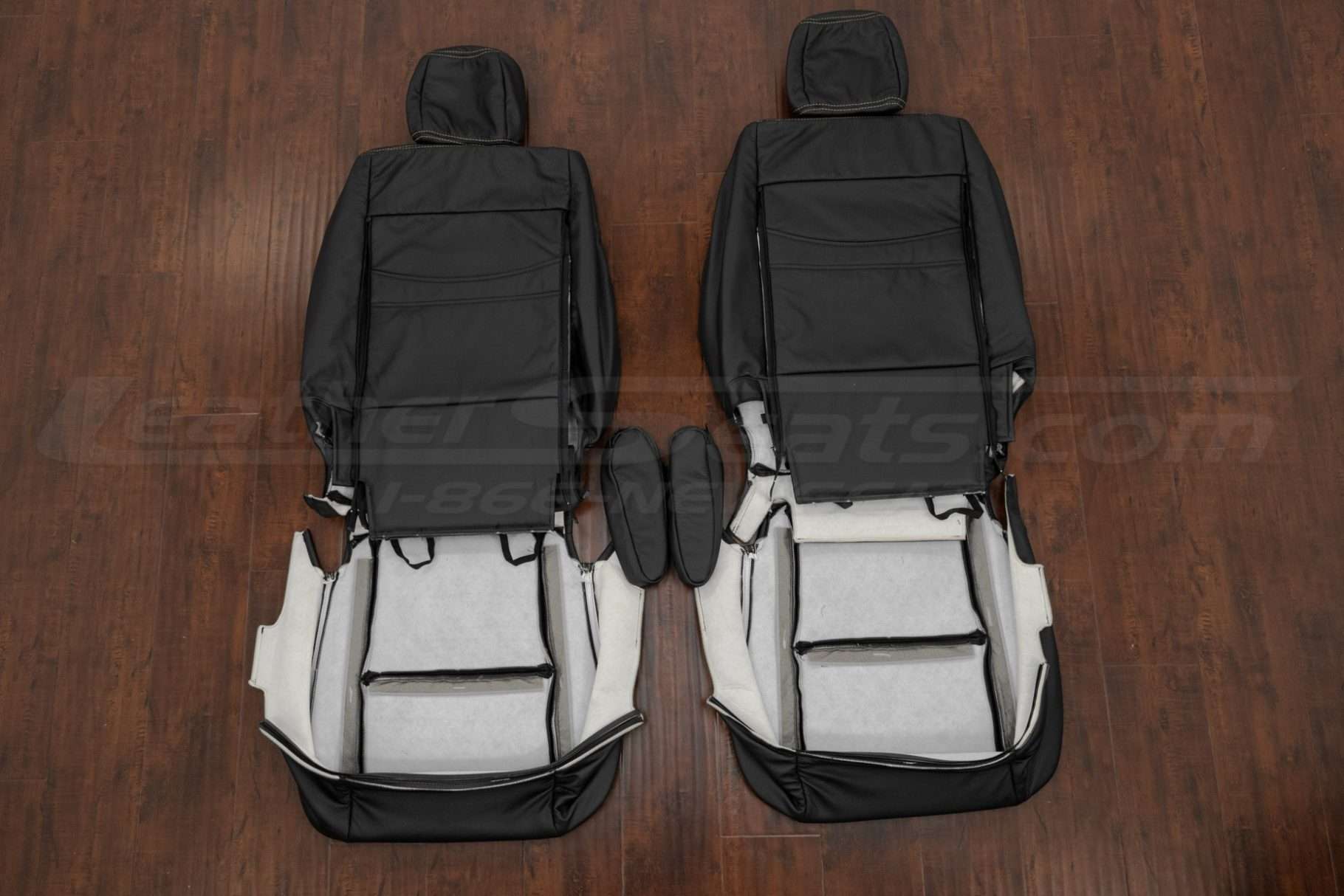 Front seat upholstery with armrests flipped