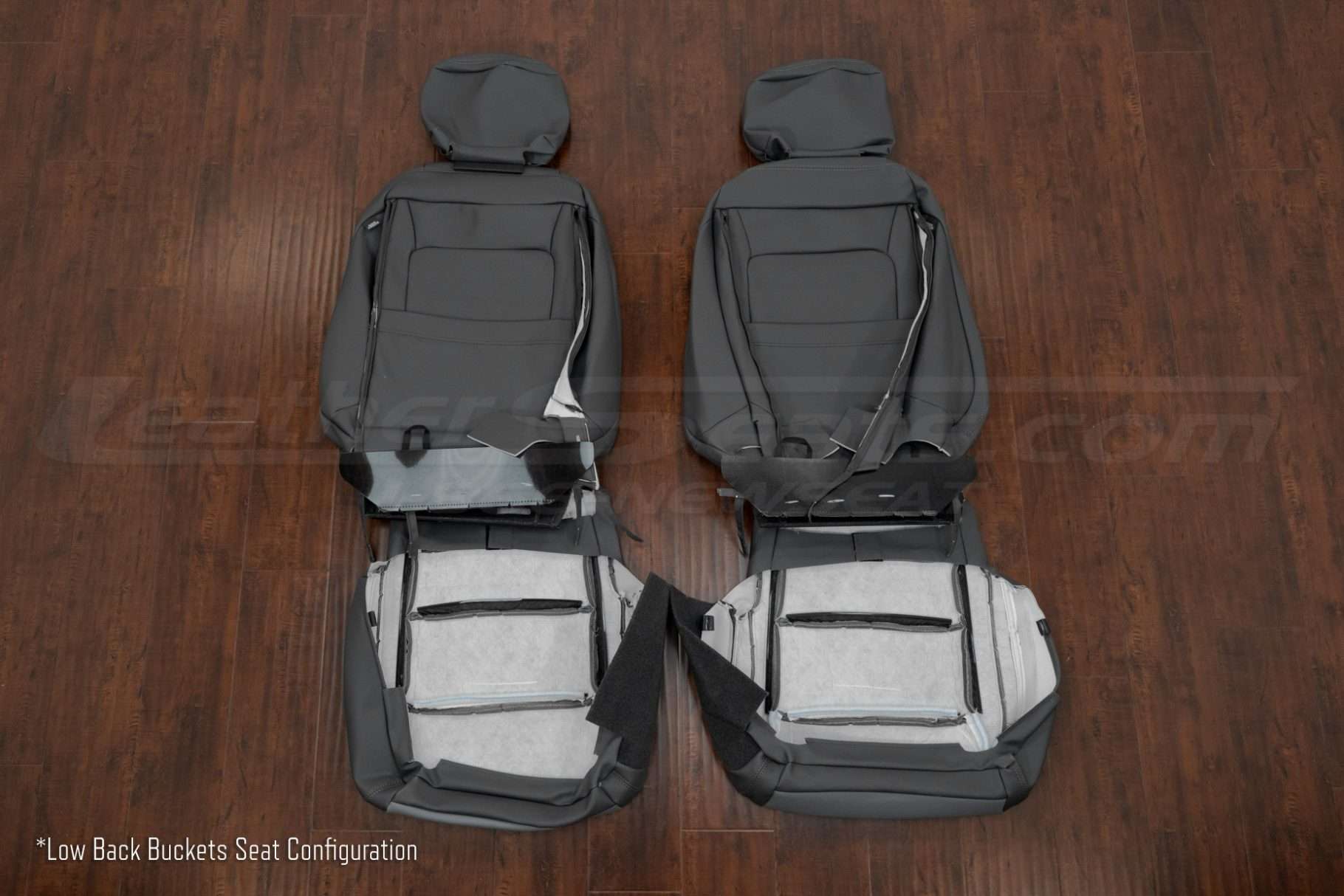 Back view of low back bucket leather seat configuration for Ford SuperDuty trucks