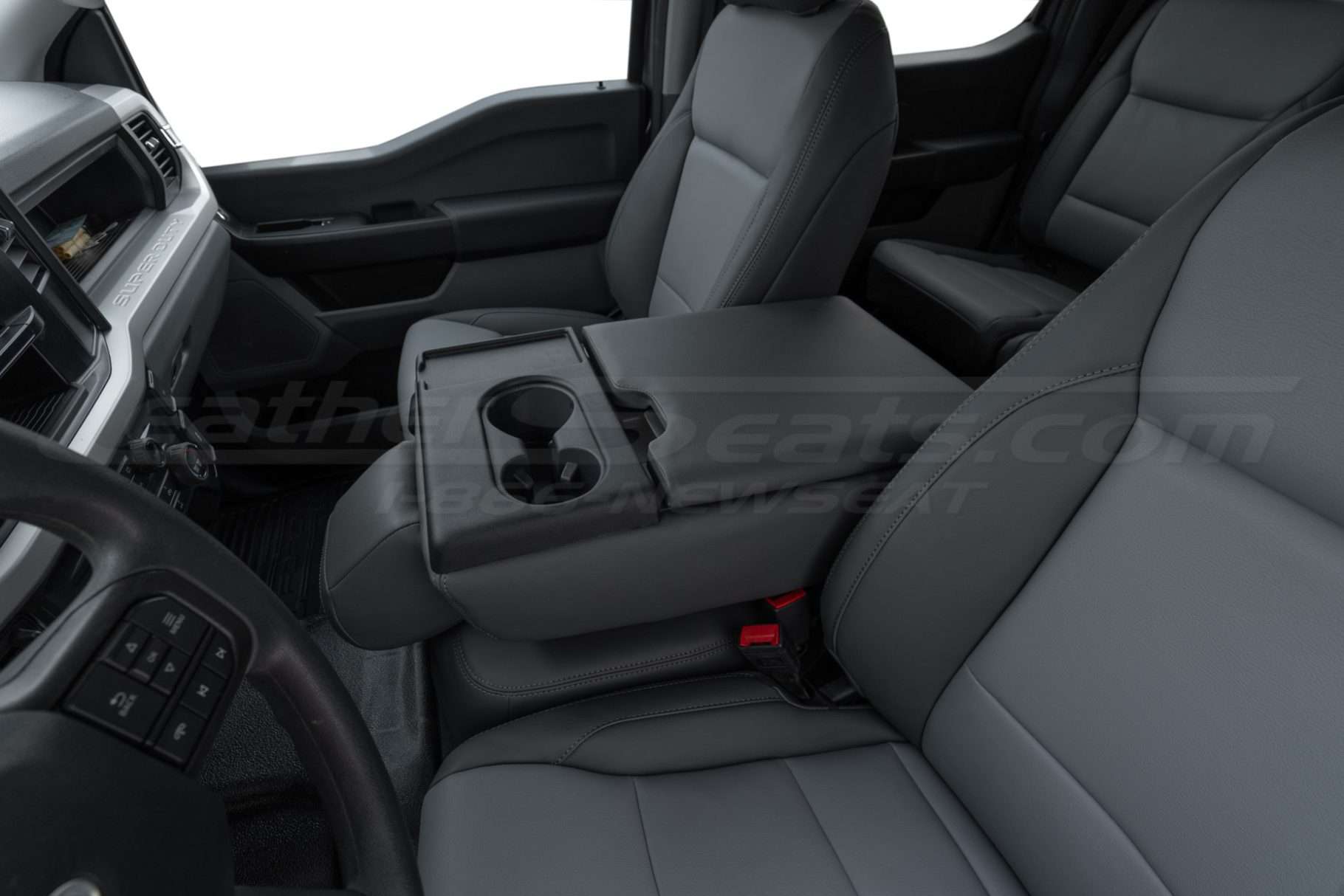 2024 Ford Superduty folded down center jump seat leather covers installed
