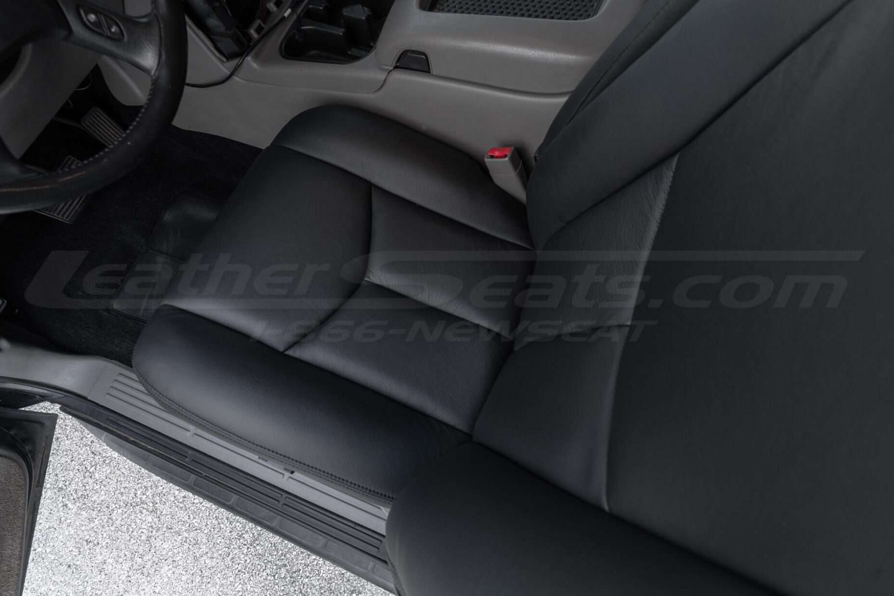 Top-down view of chevrolet tahoe with custom installed leather upholstery - front driver