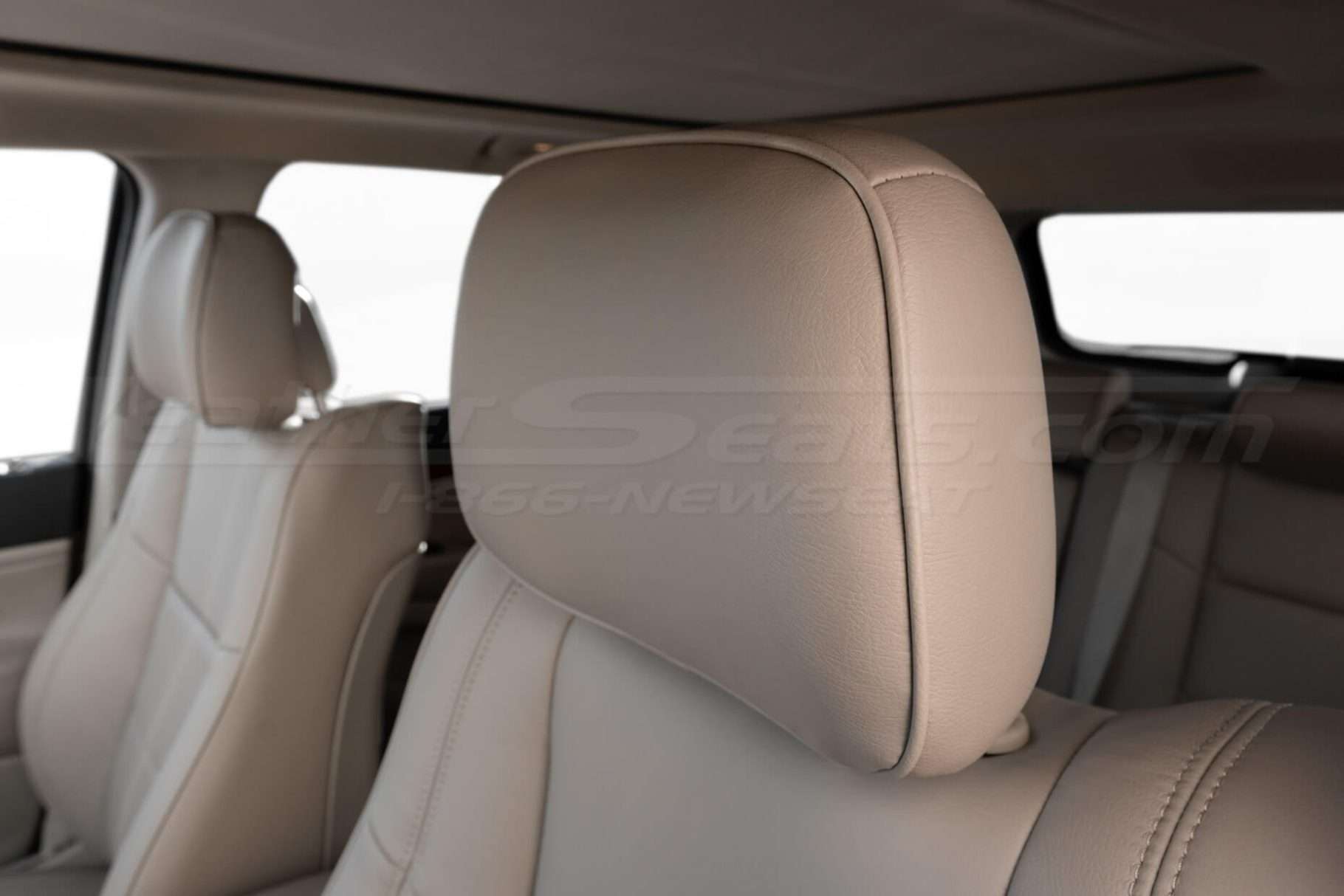 Jeep Grand Cherokee Adobe leather headrest close-up