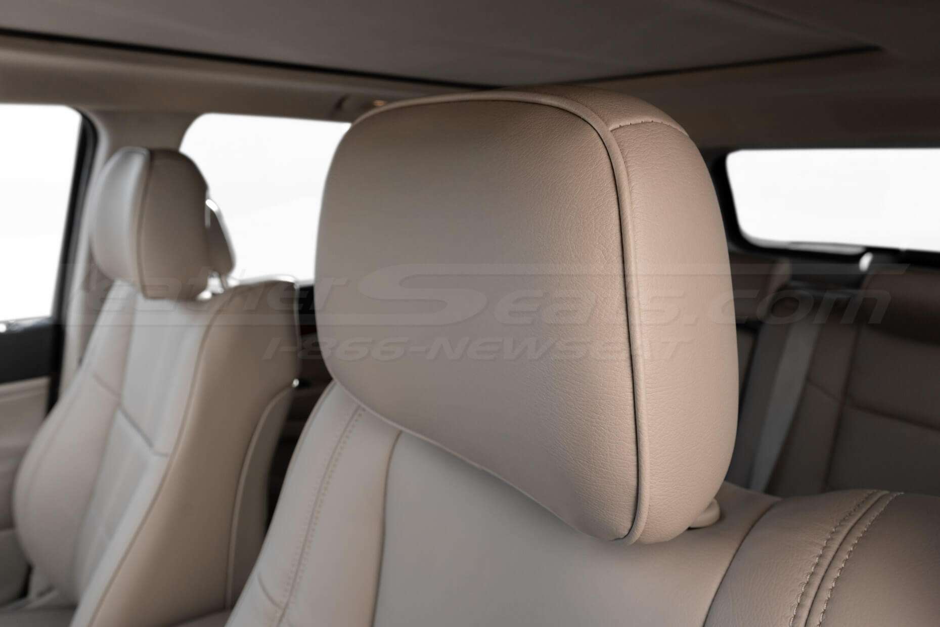 Jeep Grand Cherokee Adobe leather headrest close-up