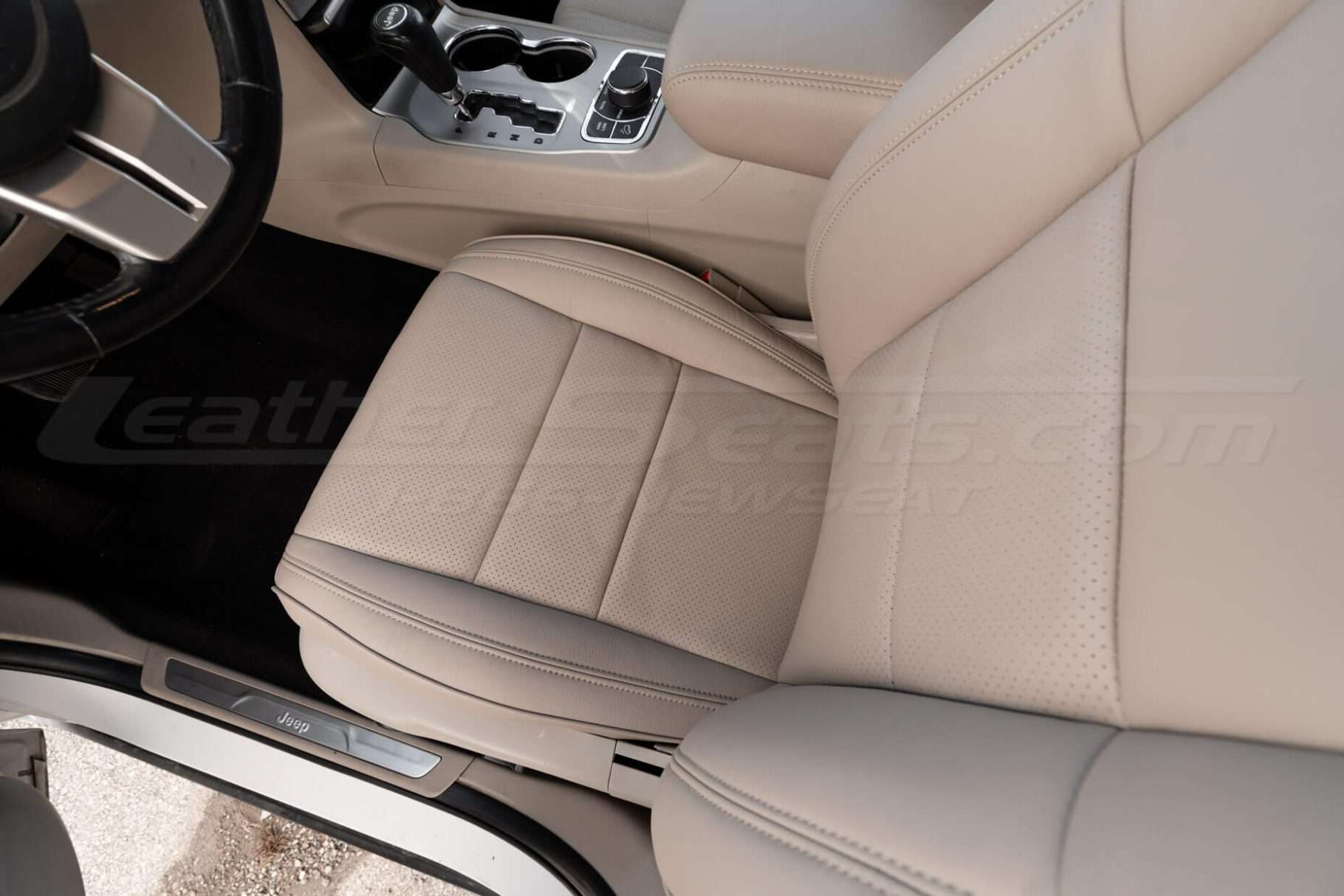 Top down view of perforated driver leather seat - installed