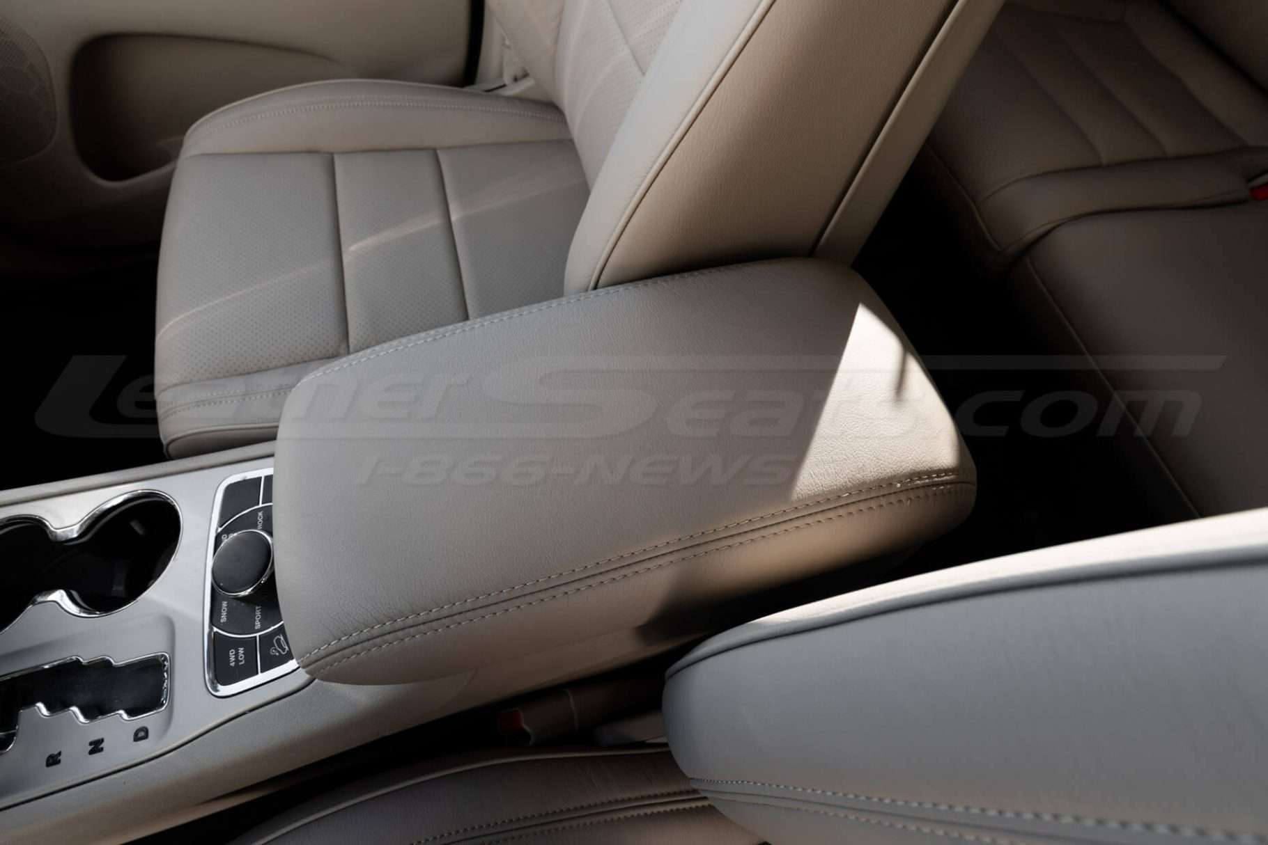 Top down side view of premium console lid cover for 2011-2022 jeep grand cherokee