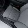 Top-down view of front driver seat with perforated combo section