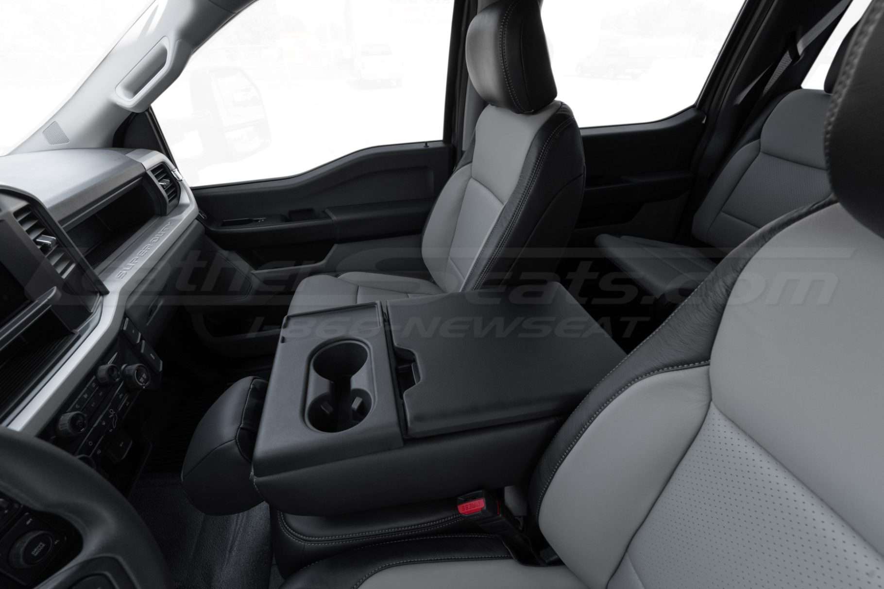Aftermarket leather jump seat in folded position