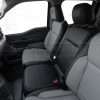 Leather installed jump seat in chair position