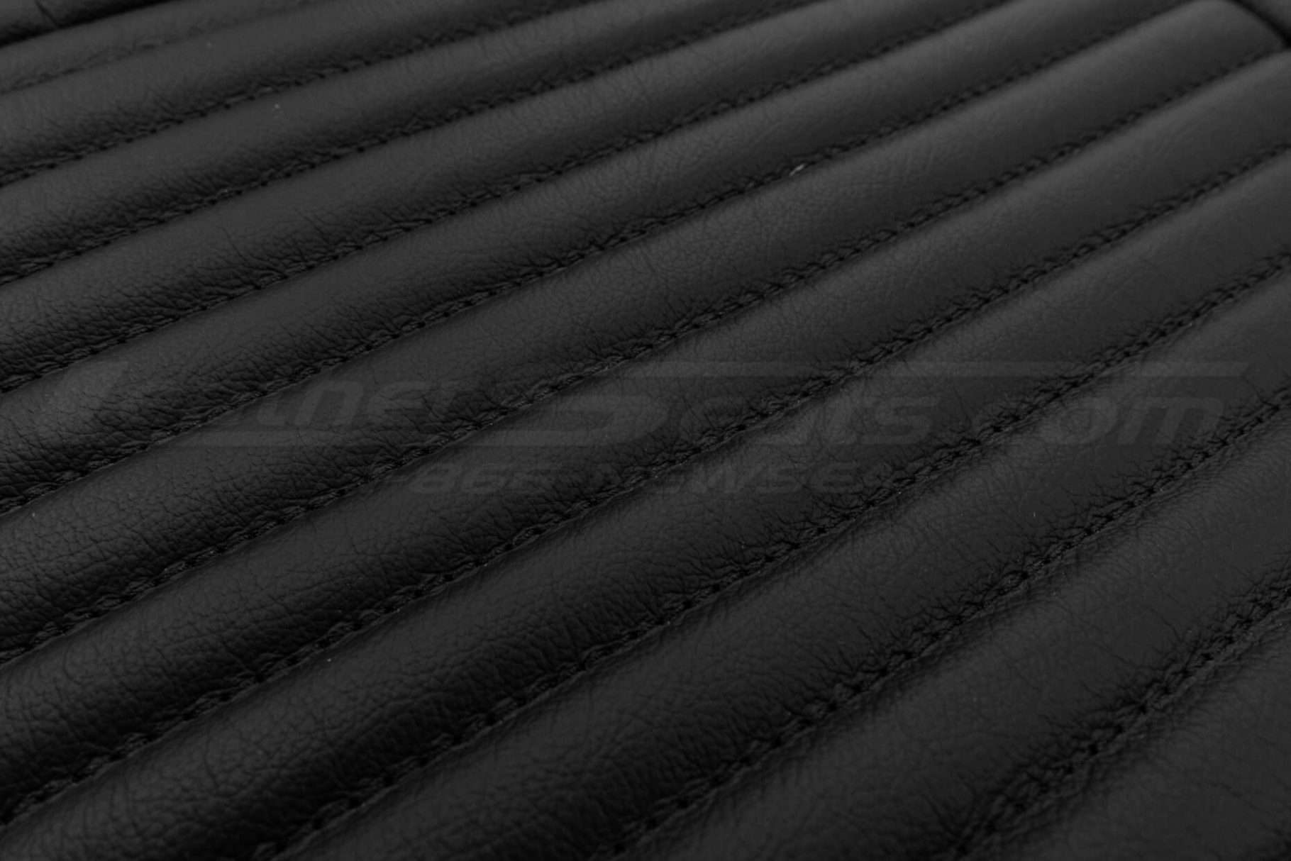 C5 Corvette black leather texture close-up