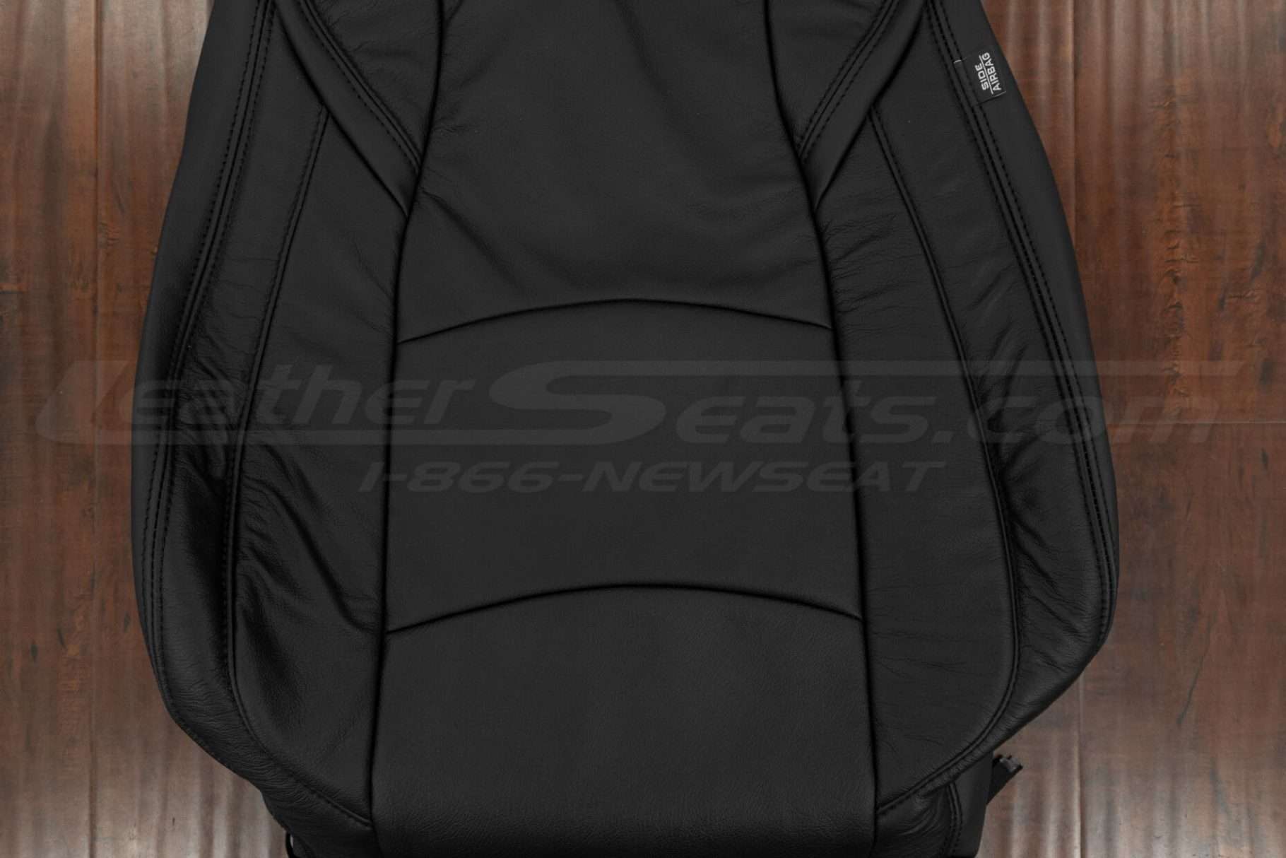 Insert section of leather backrest upholstery