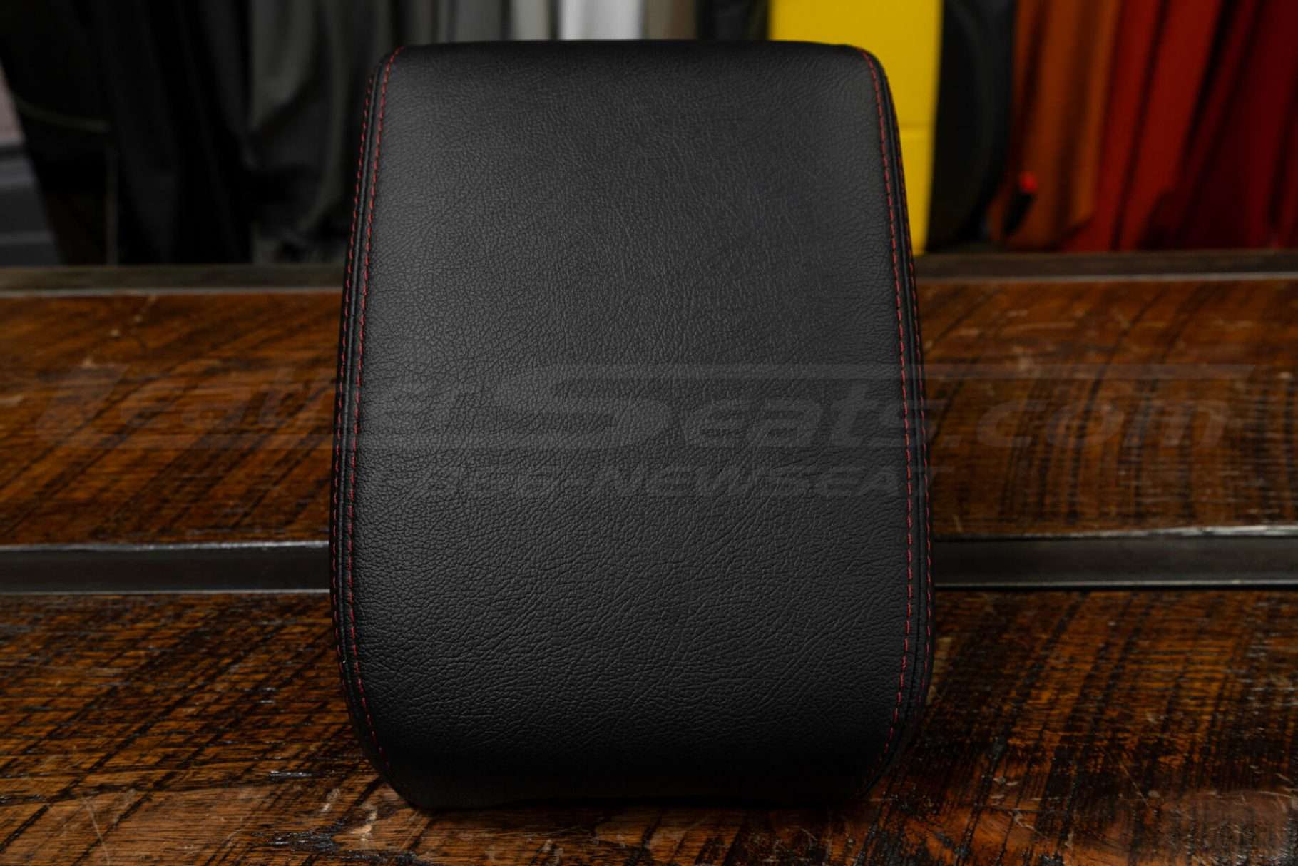 Black Toyota Tacoma leather console lid cover in Black with Red stitching
