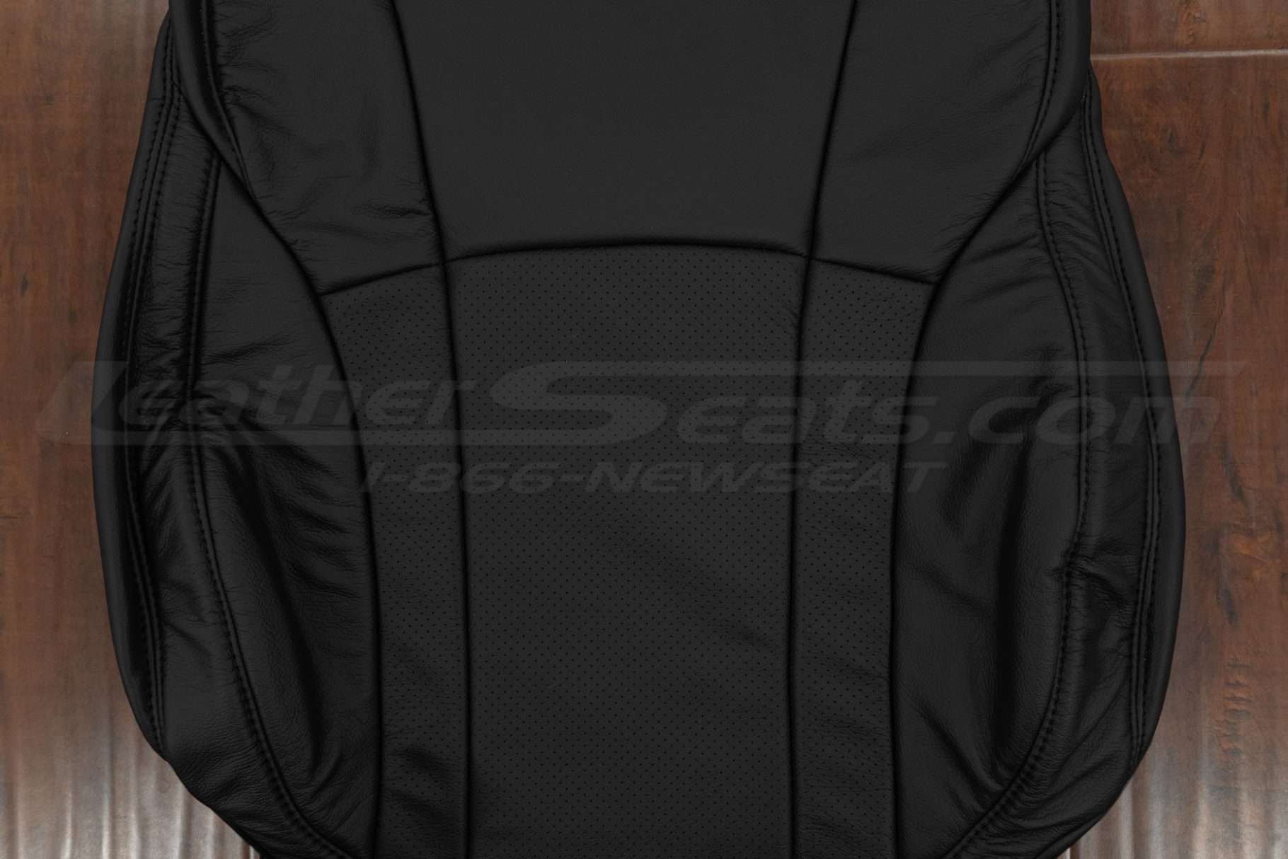 Perforated insert section of leather backrest upholstery