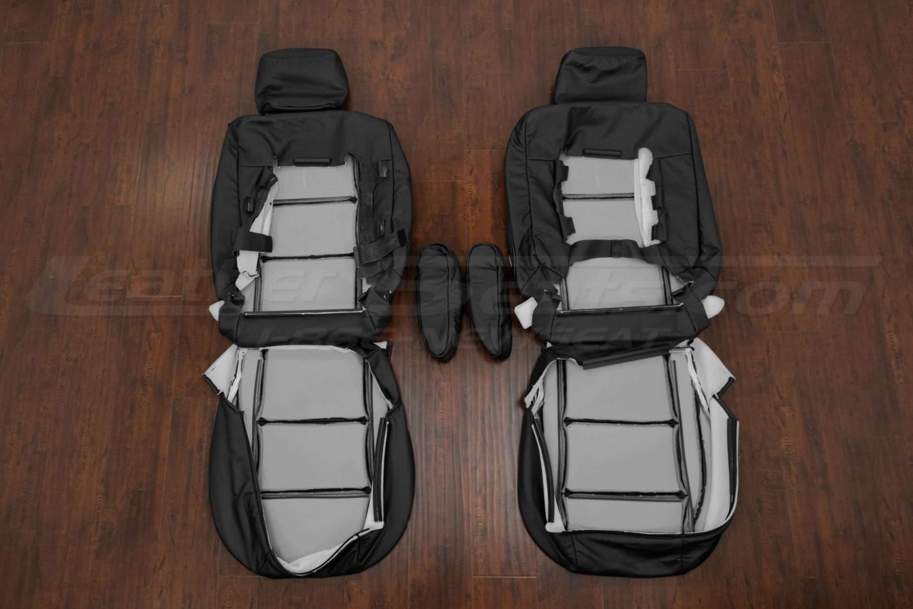 Nissan Armada aftermarket leather kit - Black - Front seat upholstery with armrests flipped