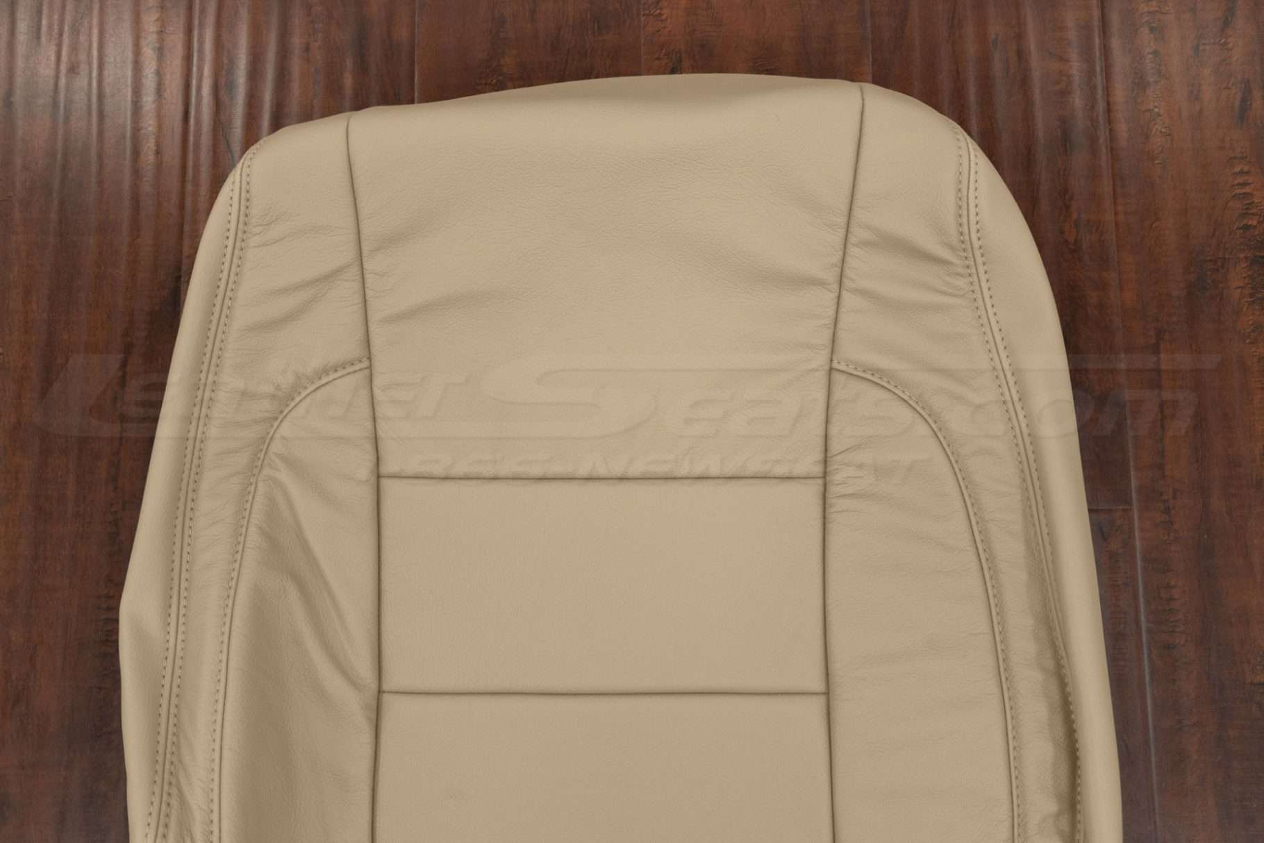 Upper section of front backrest upholstery