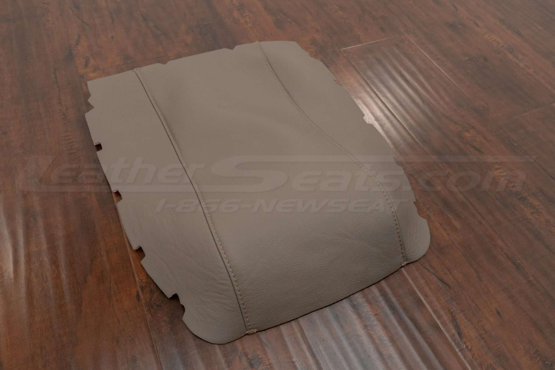 Flat lay side view of aftermarket console lid cover for Ford Expedition